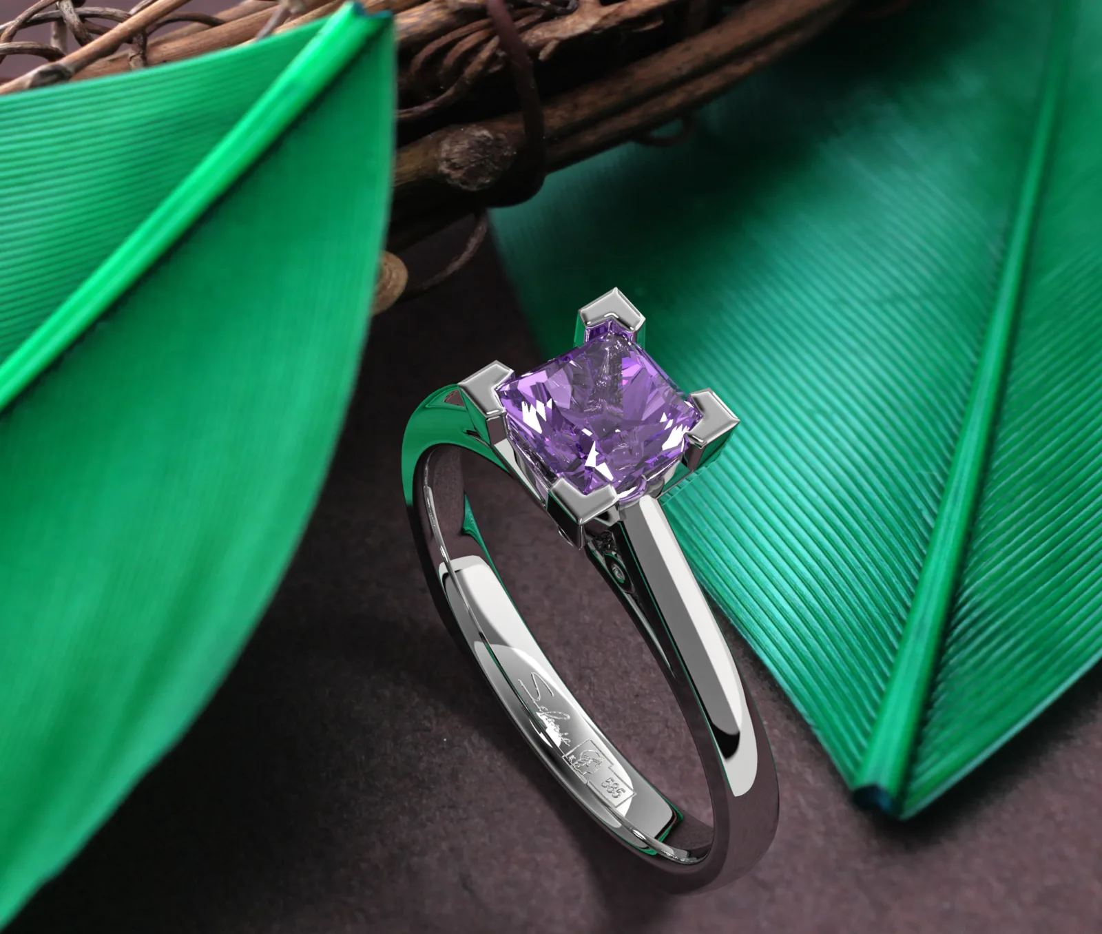 Purple gemstone ring presented between green leaves